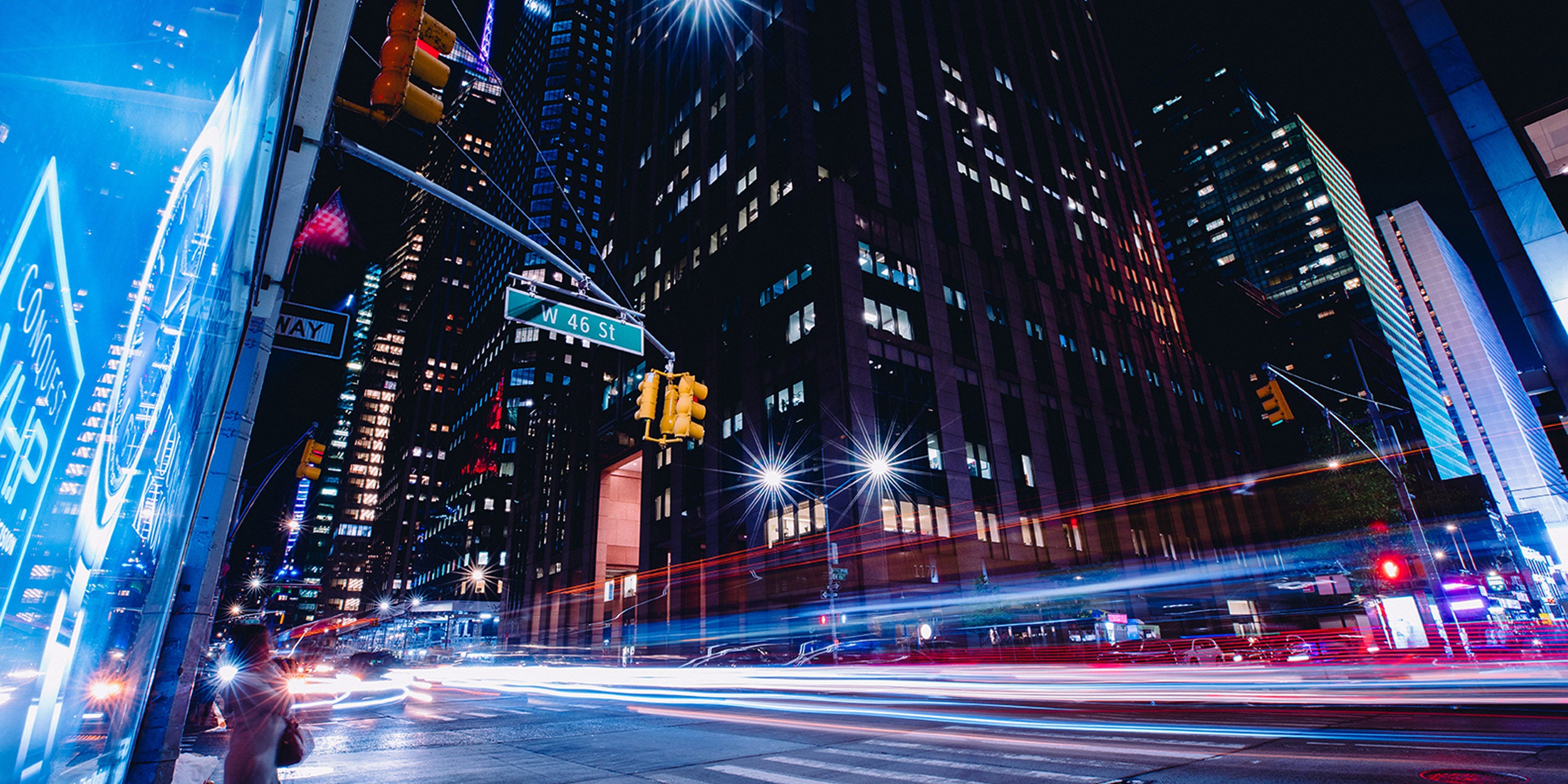 Timelapse photo of W46th street in NYC at night